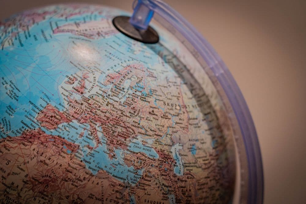 A close-up of a world globe showing Europe